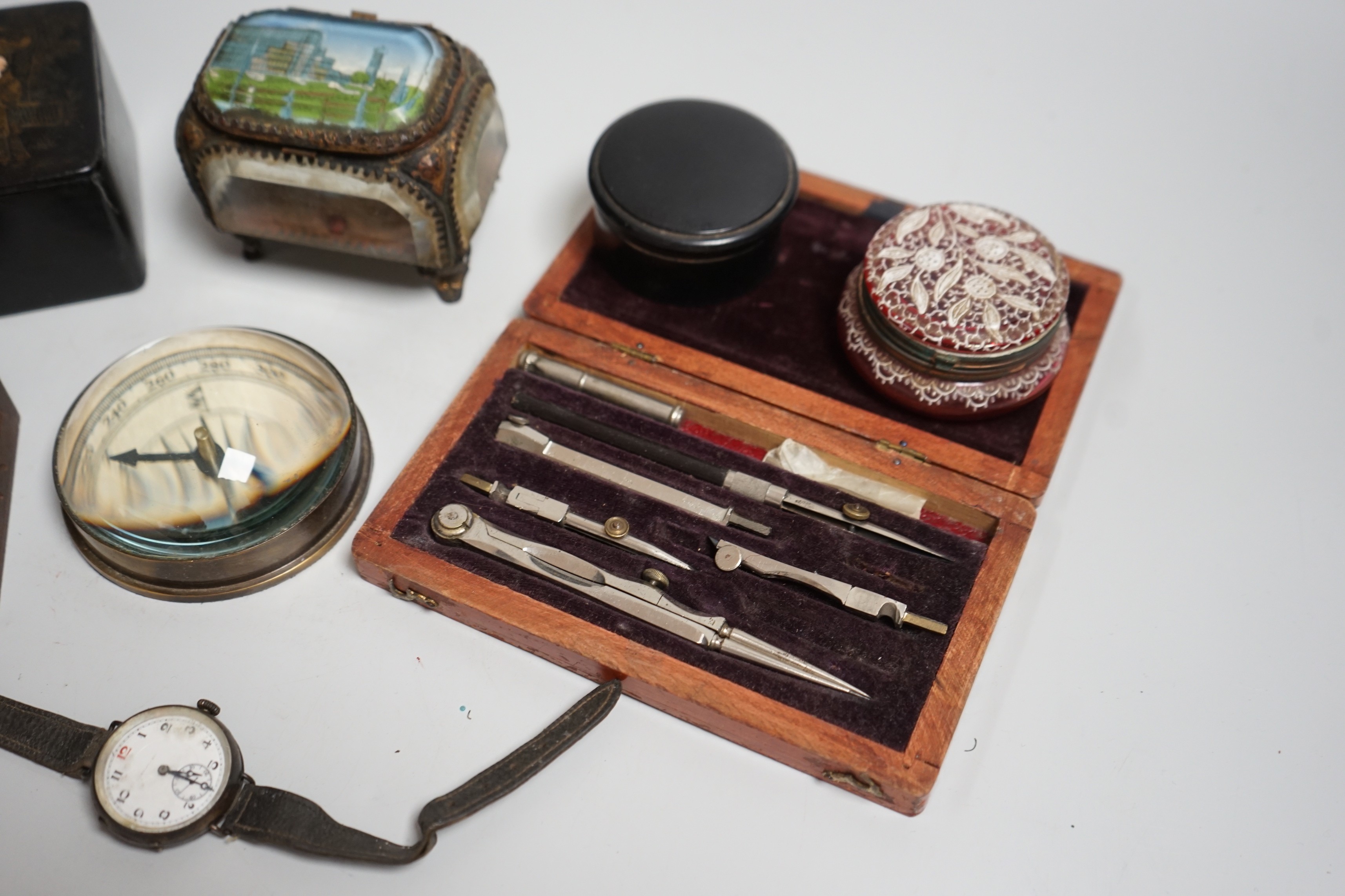 Mixed collectables: Stanley compass paperweight, a cranberry pot, a Great Exhibition souvenir casket, etc